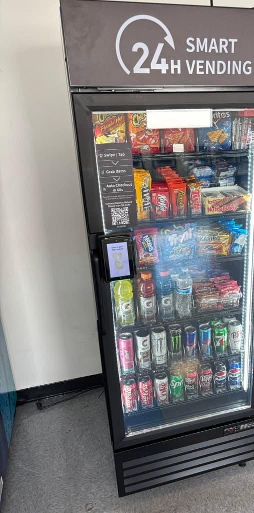 Stocked 24-hour smart vending machine with snacks and drinks