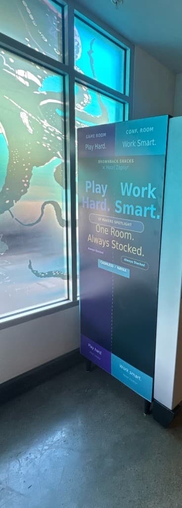 Custom-branded Brownback Snacks machine for Hotel Zephyr game room and conference room